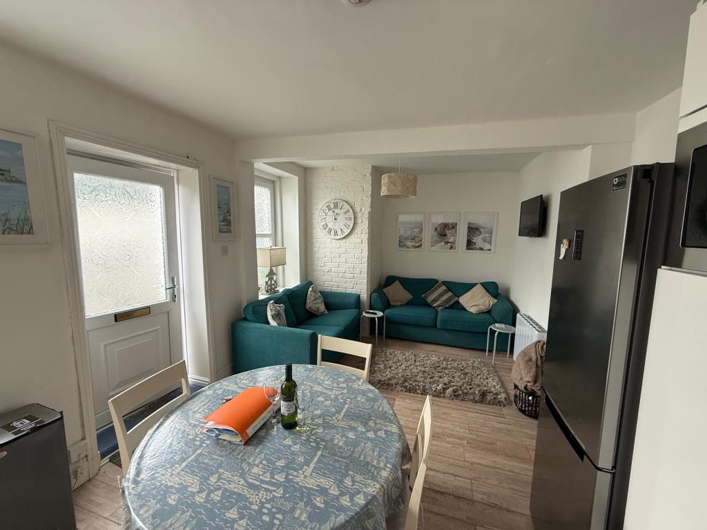 Lot: 155 - FLAT FOR INVESTMENT OR OCCUPATION - open plan kitchen and living room looking towards living room